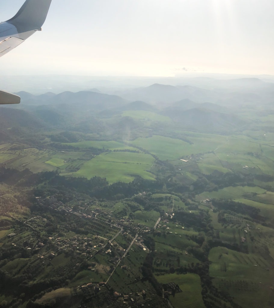 Travel photos out of airplane italy sicily green landscape